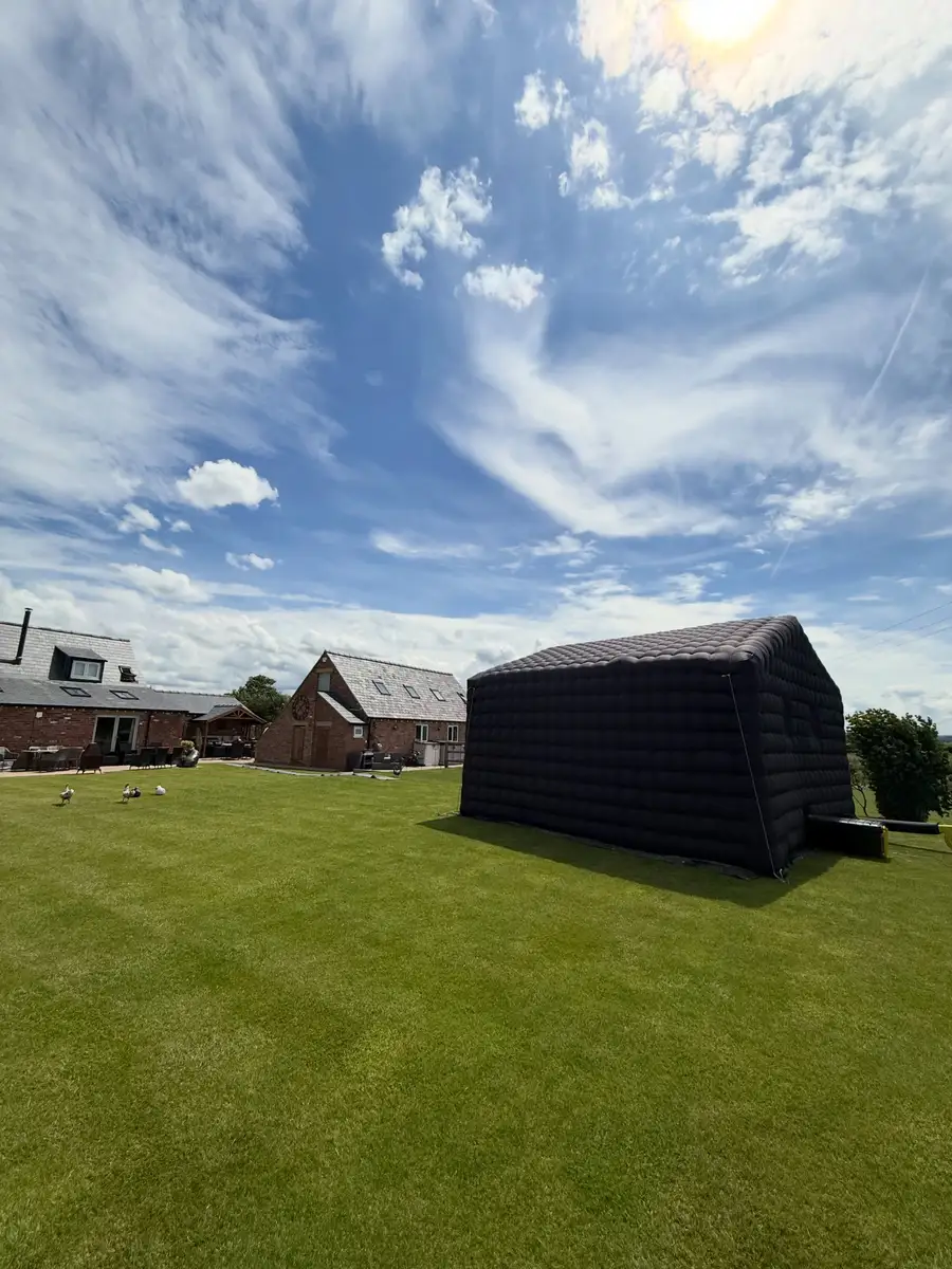 The nightclub on a wide lawn under a big sky