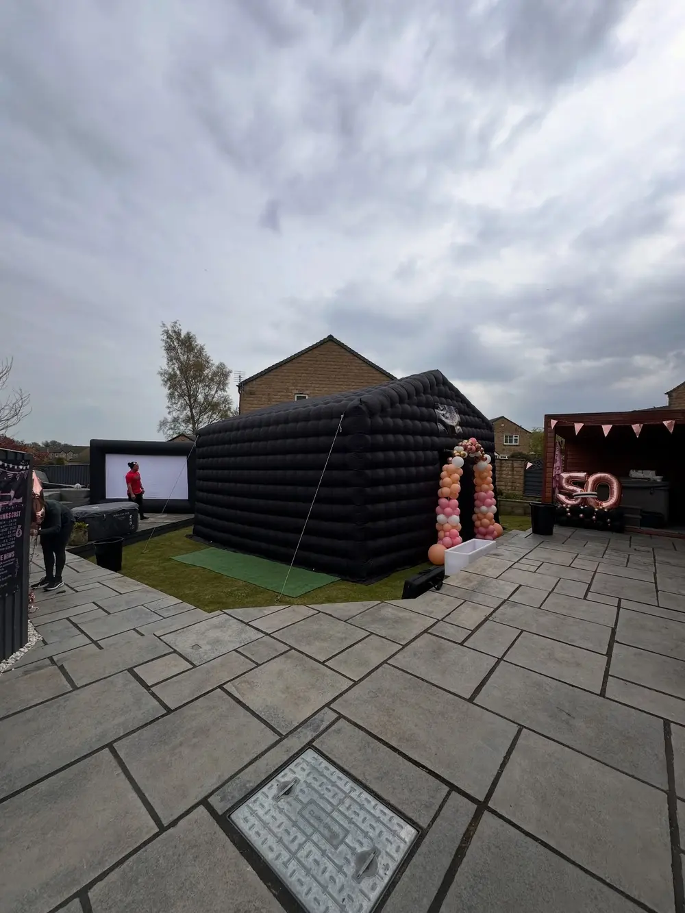 The club on a patio set up for a 50th birthday party